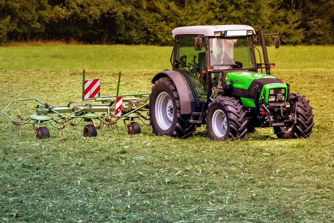 lawn mower mowing suburban yard