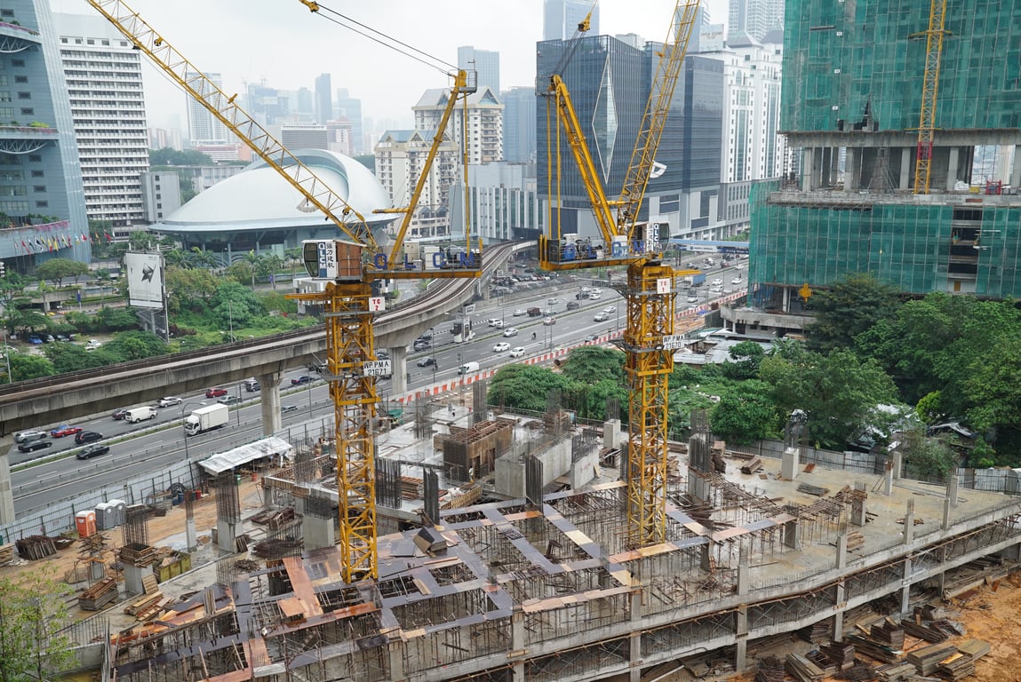 excavator on muddy construction site
