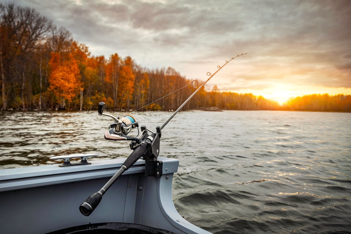aluminum fishing boat on lake