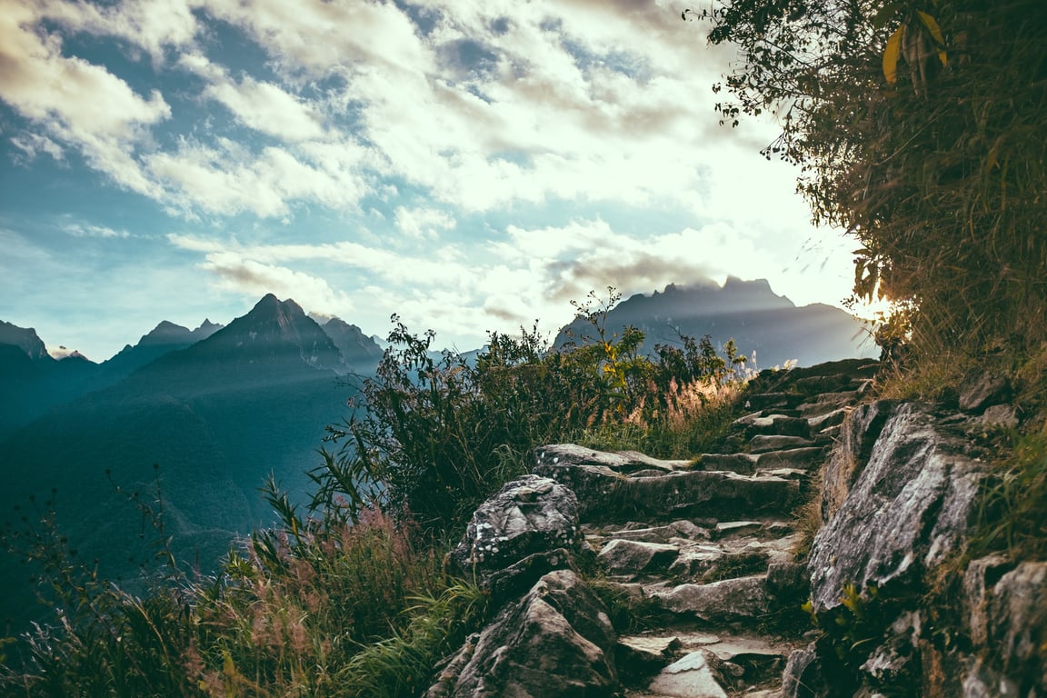 hiking boots on rocky trail