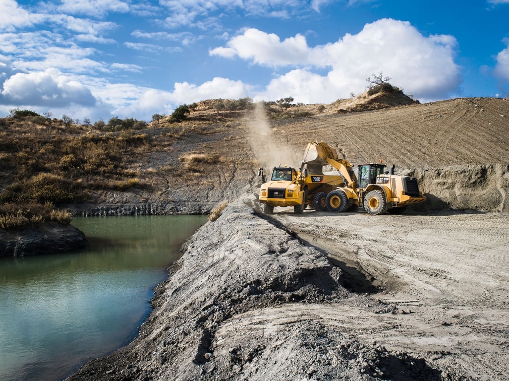 excavator loading haul truck