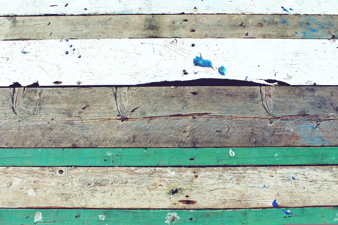boarded-up broken window