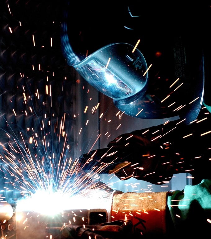 welder performing TIG welding