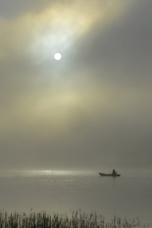 fishing boats on lake