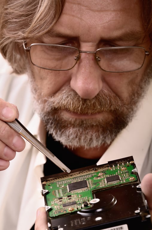 HVAC technician repairing air conditioner