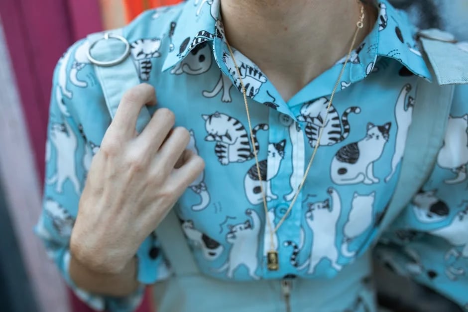 "Elegant grey designer polo shirt with a tailored fit, representing a must-have item in the '10 Best Designer Polo Shirts for Men You Need in 2025' article."