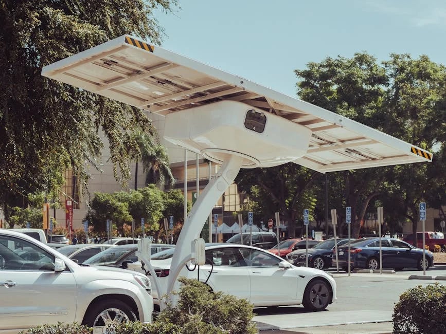 "Sleek silver electric car on a city street from the article 'Top 7 Affordable EVs for 2025 You Must See Now!'"