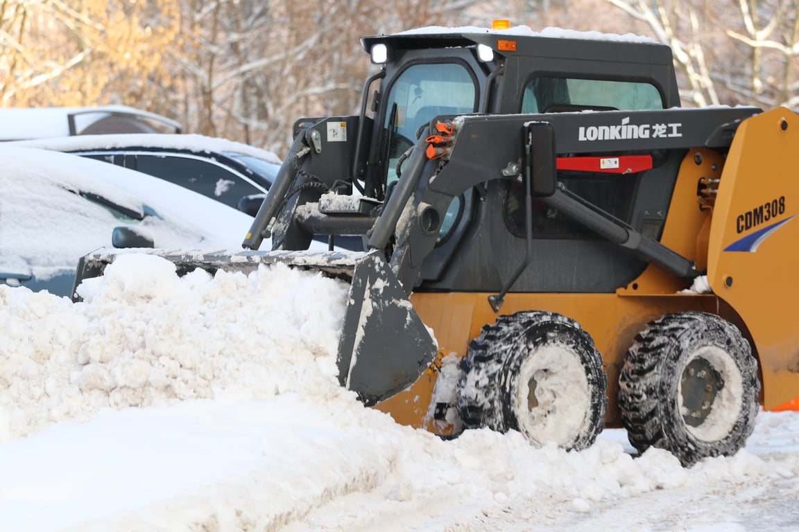 skid steer on trailer