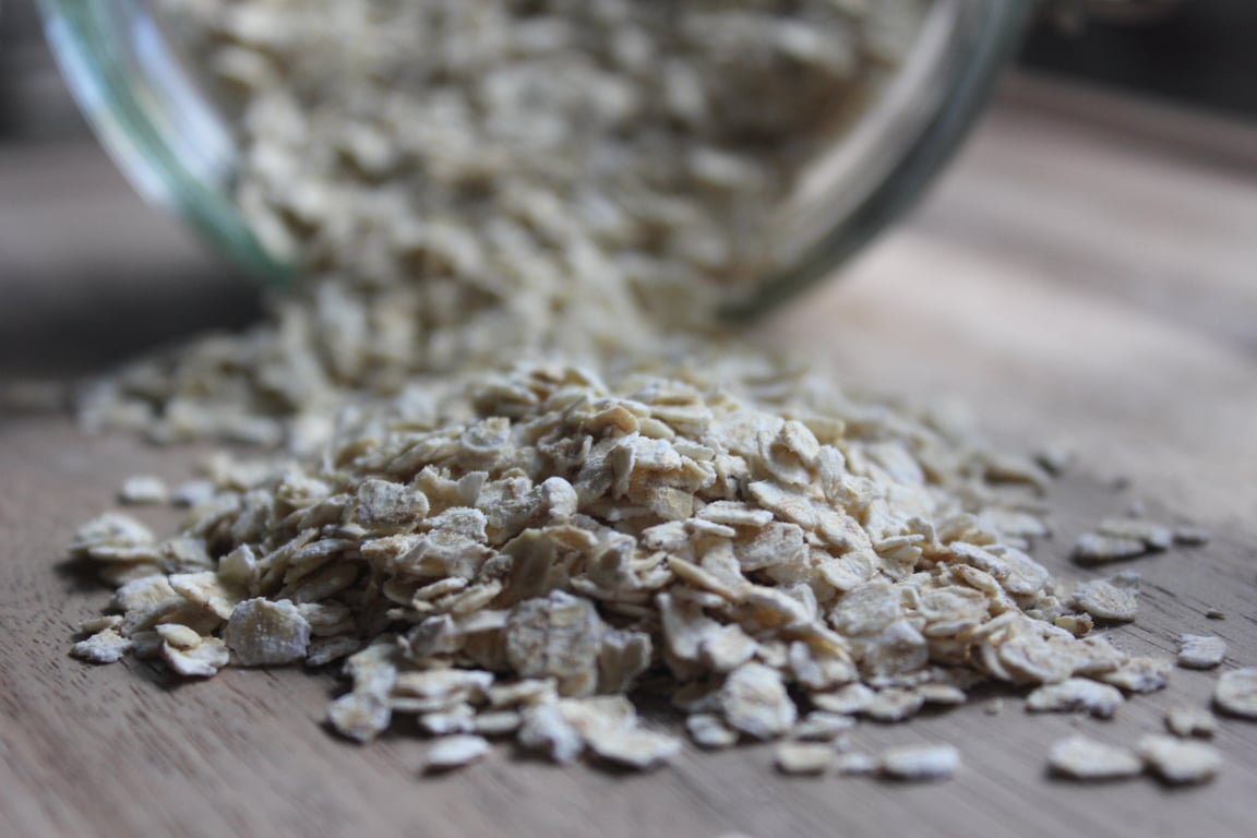 elderly woman preparing oatmeal