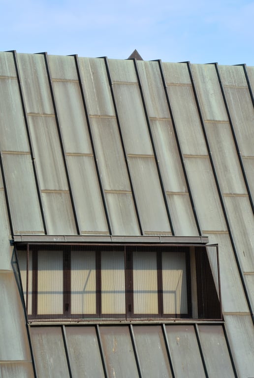 hail-damaged metal roof