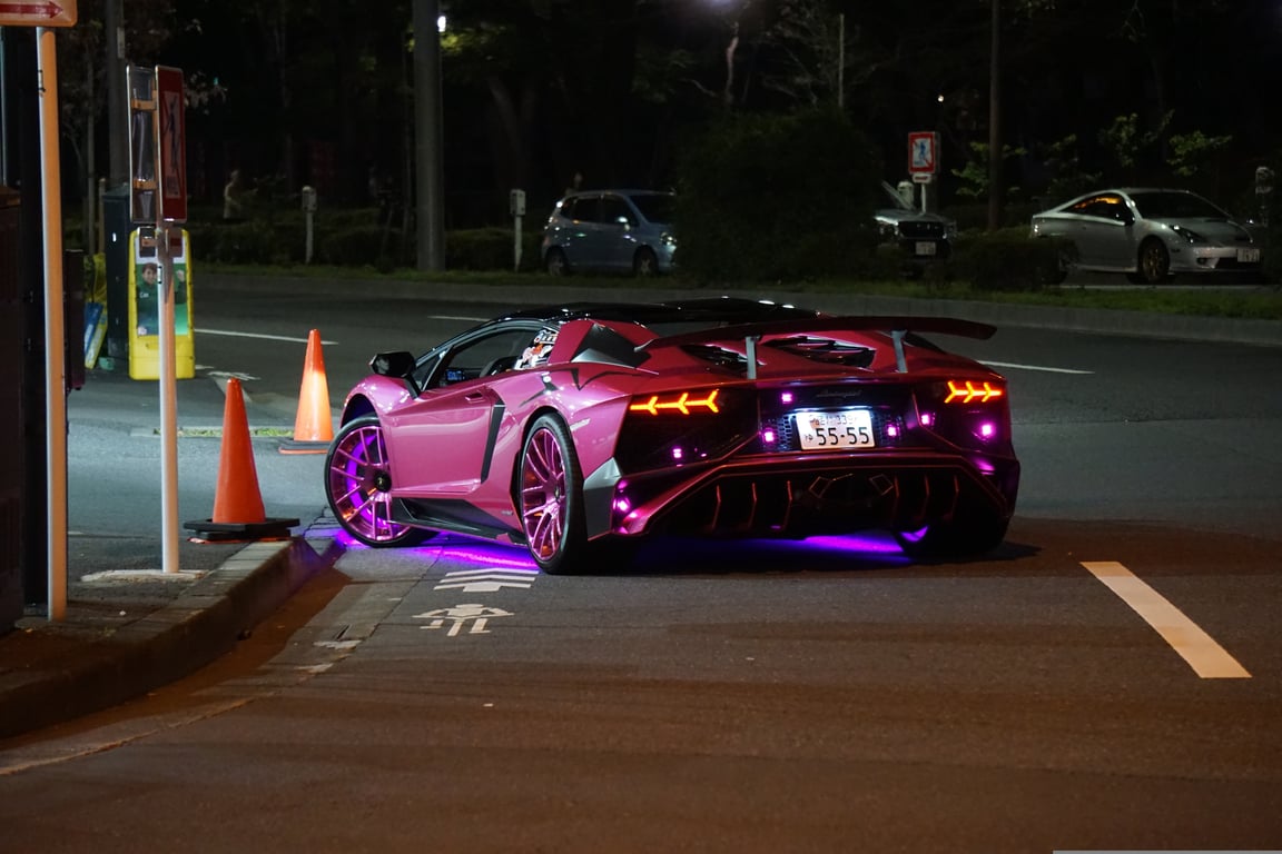 car towing trailer at night