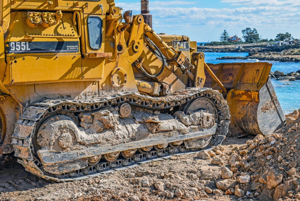 compact wheel loader loading gravel