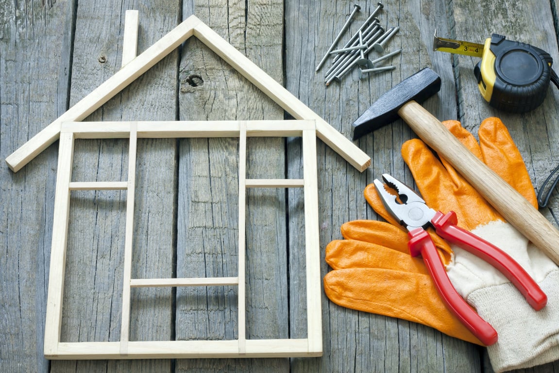 home renovation contractor reviewing plans