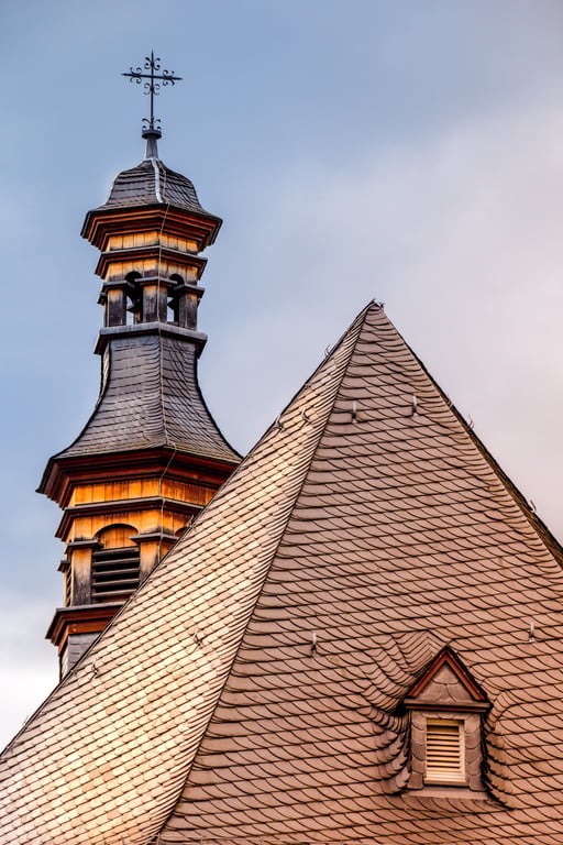 wind-damaged roof shingles