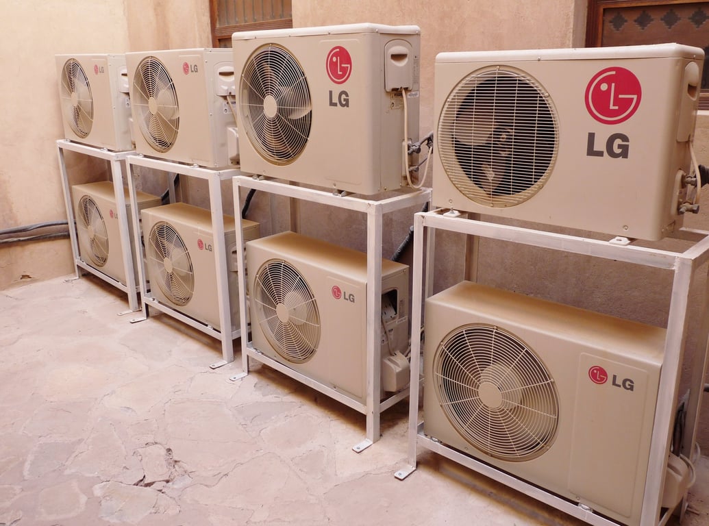 HVAC technician installing air conditioner