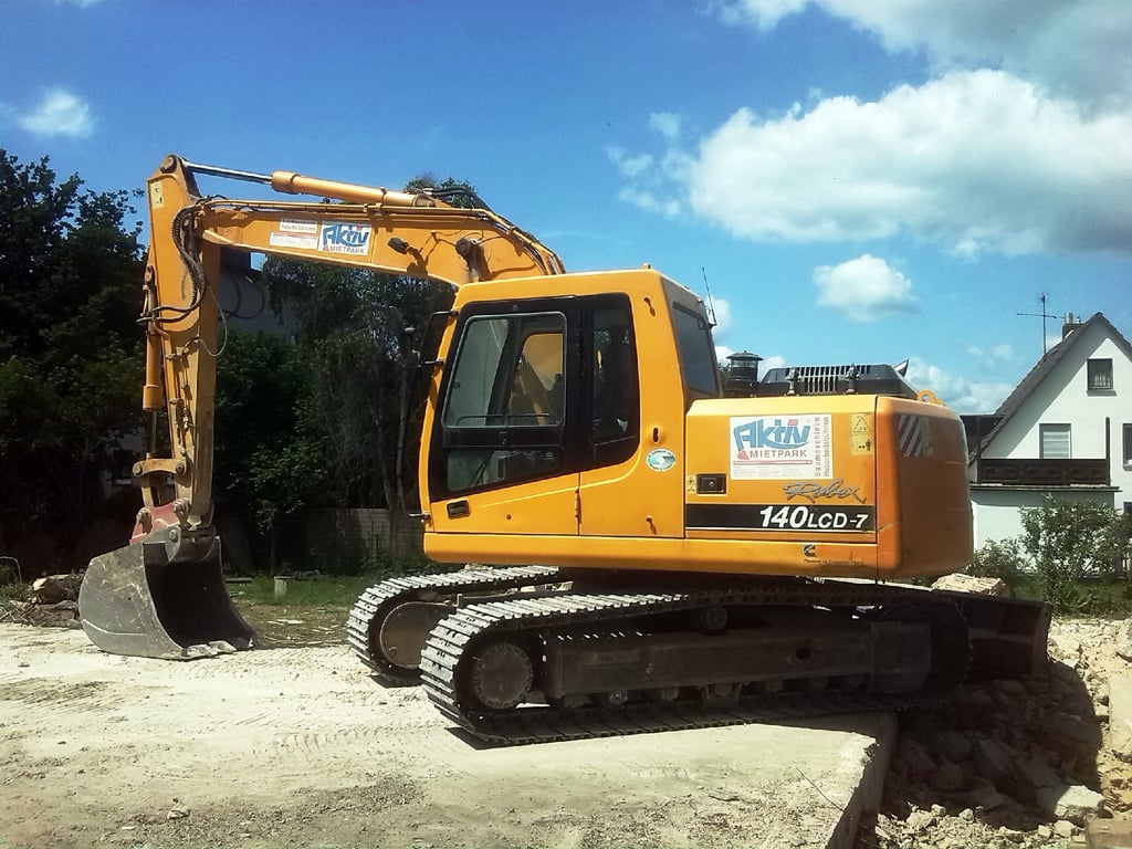 compact excavator construction site