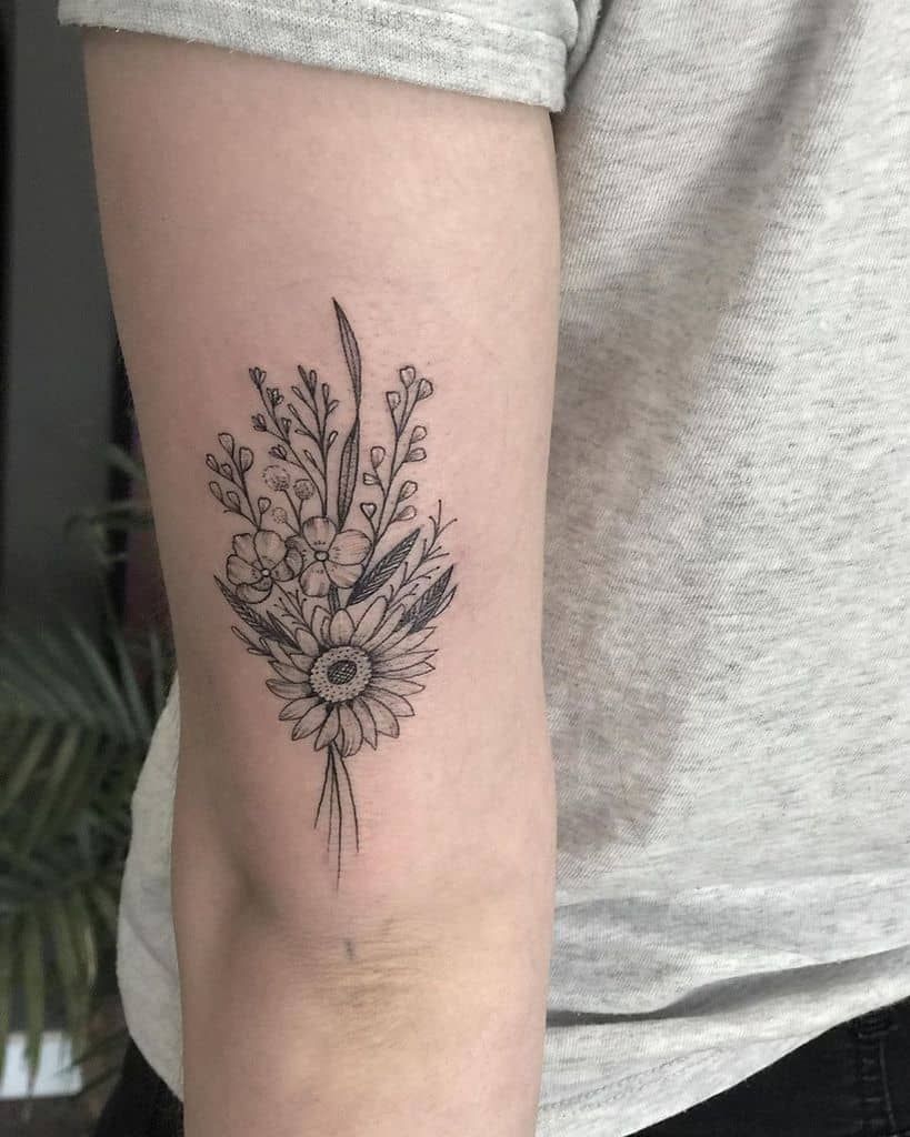25 Blooming Flower Tattoo Ideas That Will Make You Swoon