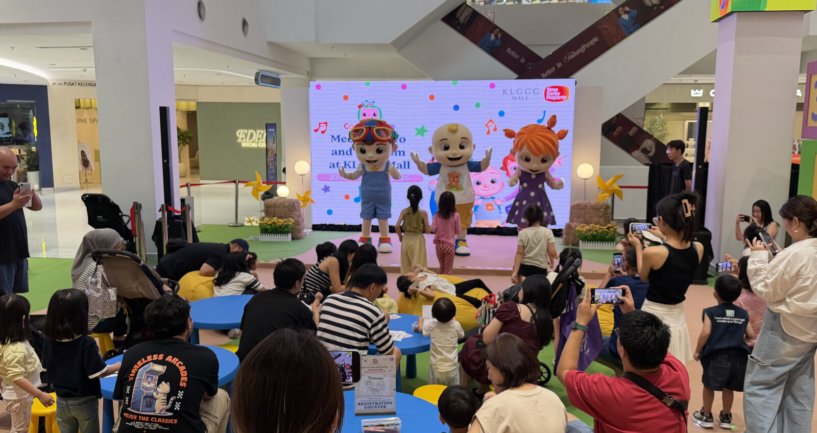Families enjoying a Cocomelon show at KLGCC Mall