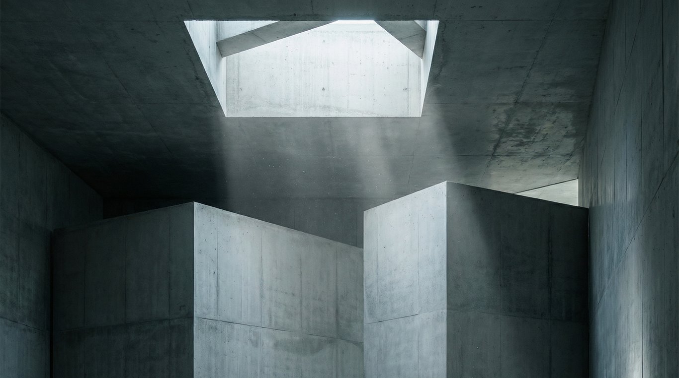 Vue décalée du loft avec textures béton et métal