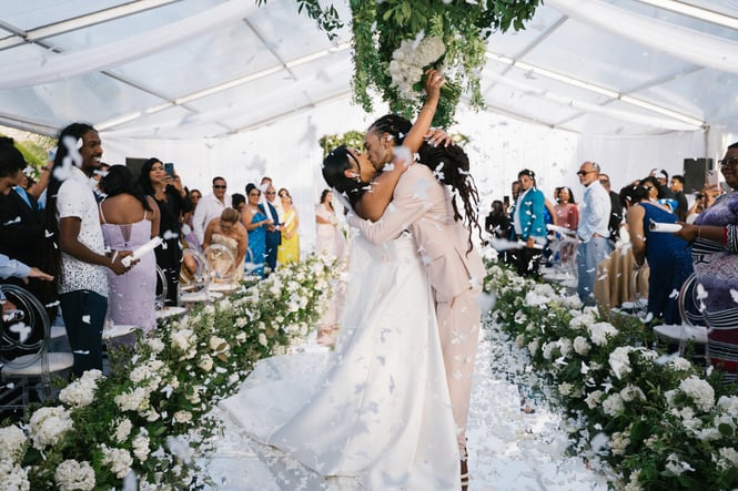 wedding ceremony — couple kissing from a wedding in Trinidad by Kinesis Weddings