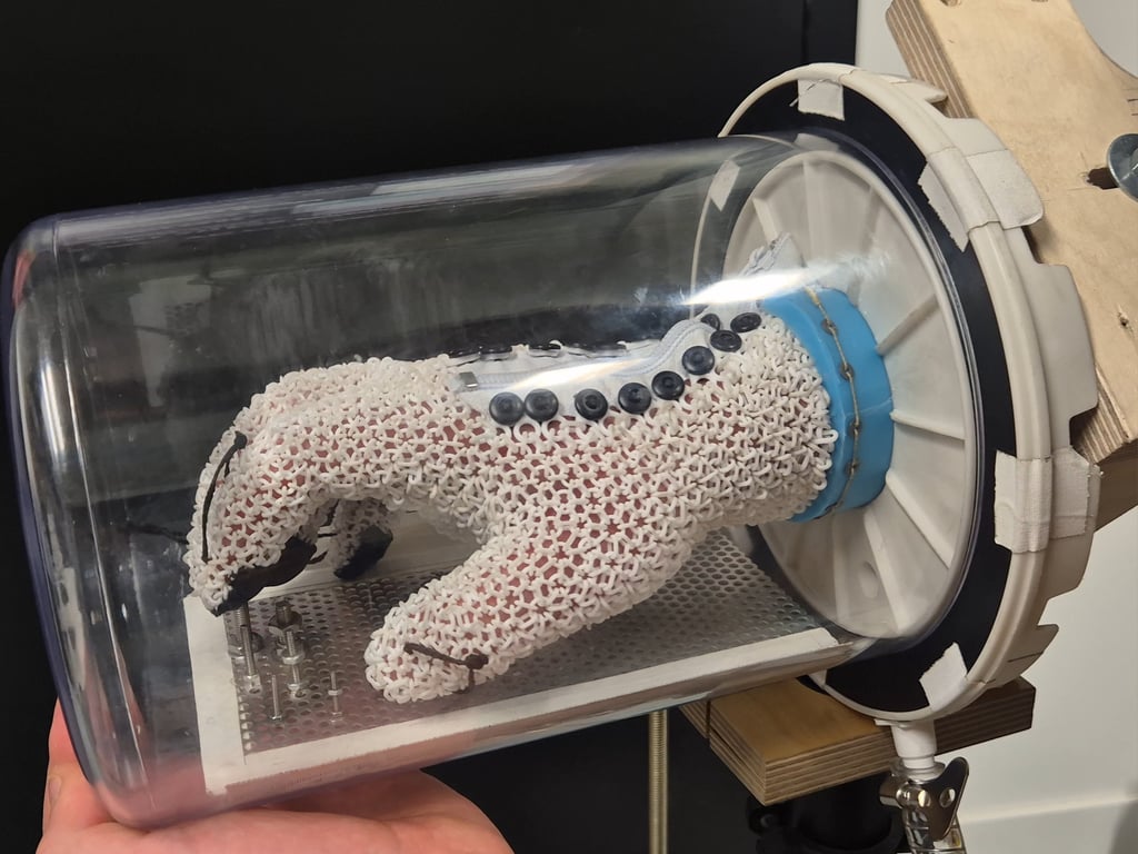 Close-up of Starsuit chainmail lattice structure showing manufacturing precision