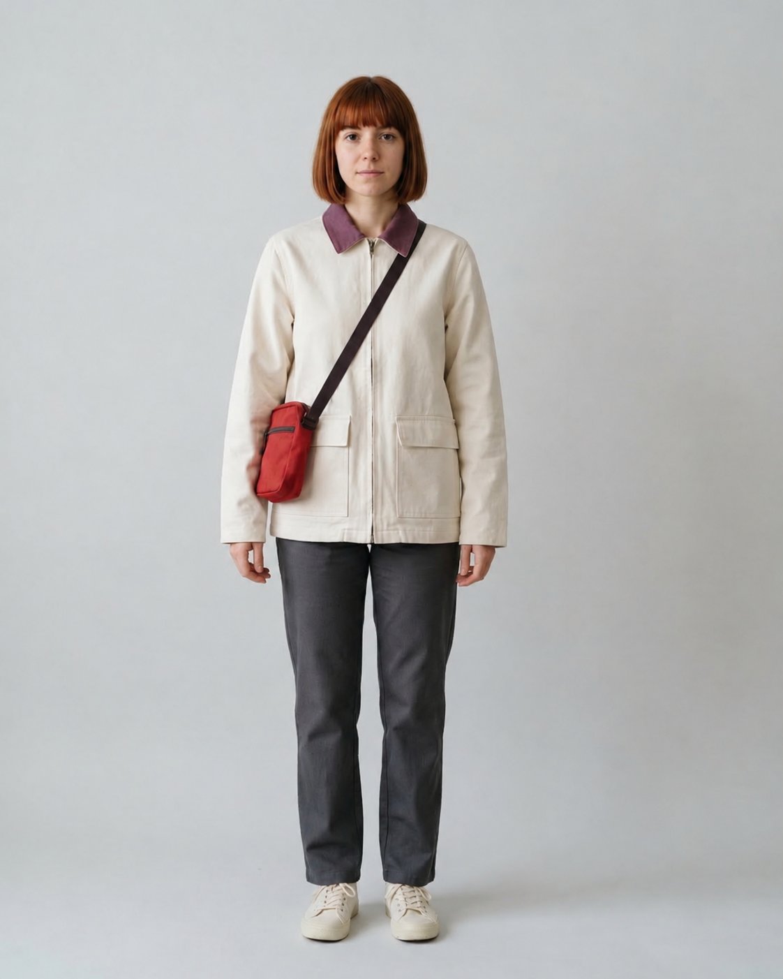 Mika's off-white jacket with a plum collar and red crossbody
bag