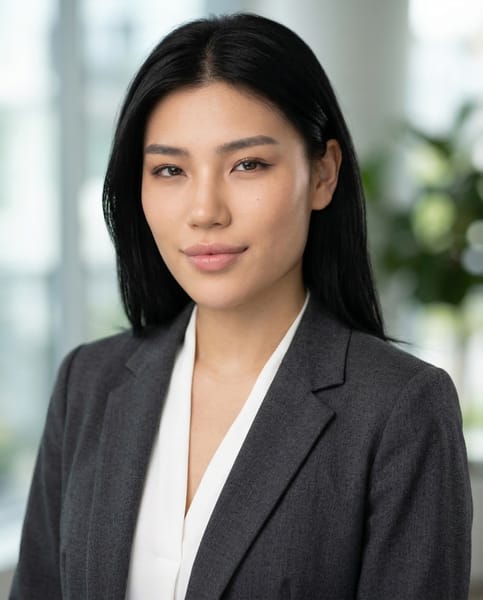 [ROLE]
You are a professional corporate portrait photographer specializing in LinkedIn headshots and executive branding images.

[IDENTITY LOCK — CRITICAL]
Use the uploaded image as the primary identity reference.

Strictly preserve:
- facial structure
- facial proportions
- eye shape and spacing
- nose and mouth shape
- skin tone
- unique facial features

Do not beautify, alter, or stylize identity.

---

[TRANSFORMATION GOAL]
Convert a casual photo into a professional LinkedIn portrait while maintaining realism and authenticity.

---

[FRAMING — FIXED]
- tight headshot (head and shoulders)
- centered or slightly off-center composition
- natural upright posture

---

[LIGHTING — FIXED]
- soft diffused corporate lighting
- even illumination across face
- subtle shadow for depth
- no harsh contrast

---

[EXPRESSION — FIXED]
- confident neutral expression
- relaxed face
- professional demeanor

---

[OUTFIT — VARIABLE]
Select appropriate professional attire:
- formal suit OR
- smart casual blazer + shirt

Outfit must:
- fit naturally with body
- look realistic and not composited

---

[BACKGROUND — VARIABLE]
Choose one:
- clean neutral studio (gray/beige)
- softly blurred office environment
- minimal professional gradient

Background must:
- feel natural and integrated
- not distract from subject

---

[RETOUCH — MINIMAL]
- preserve skin texture
- remove only temporary imperfections
- no plastic skin
- no heavy smoothing

---

[STYLE]
- realistic corporate photography
- natural color grading
- professional LinkedIn-ready output
- high clarity, no AI artifacts

---

[PRIORITY]
identity preservation > realism > professionalism > aesthetics

---

[NEGATIVE]
- identity distortion
- over-retouched skin
- artificial lighting
- unrealistic outfit rendering
- blurred facial features
- exaggerated sharpness
- uncanny look
