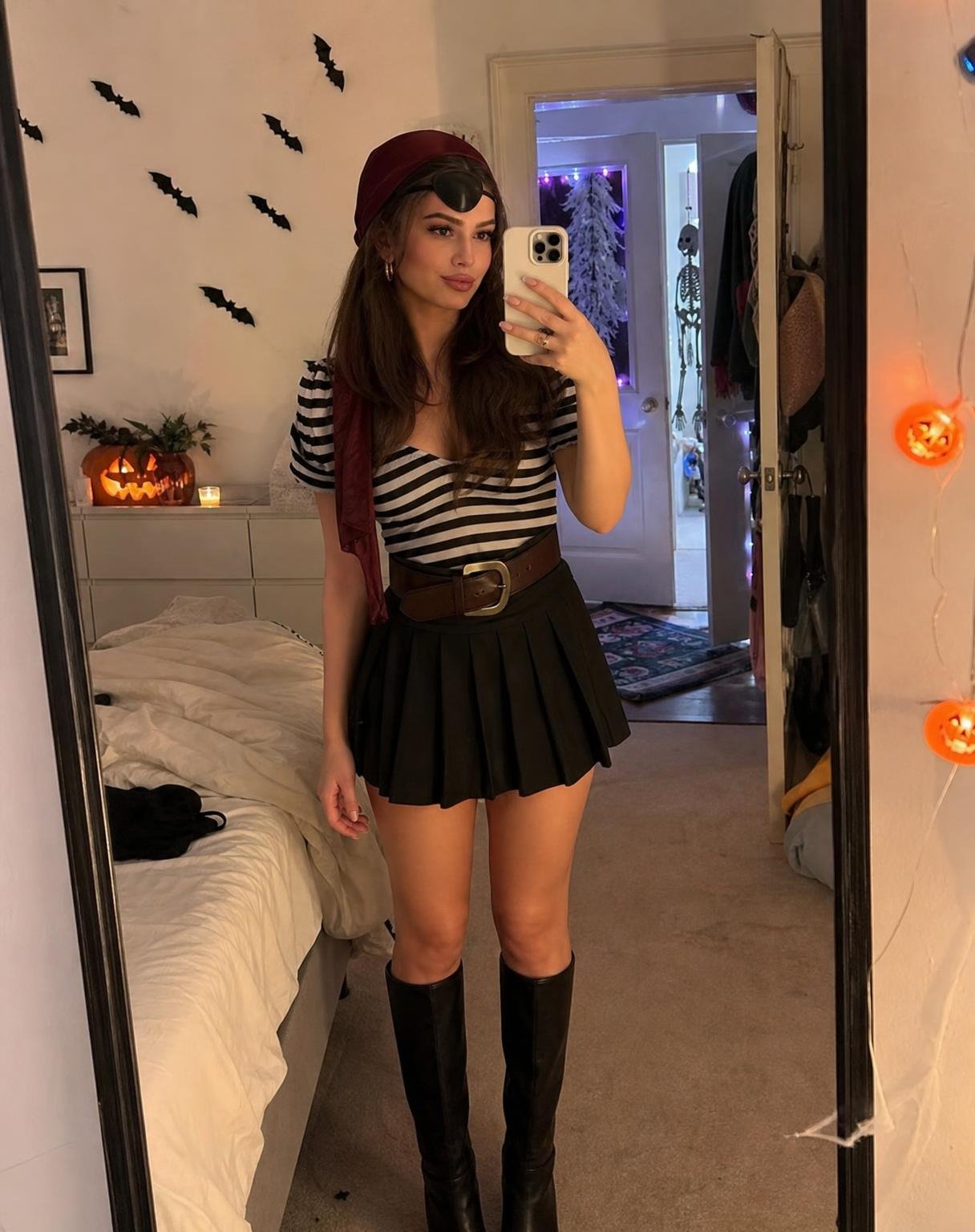 Create an extremely realistic, spontaneous iPhone mirror selfie of a young woman