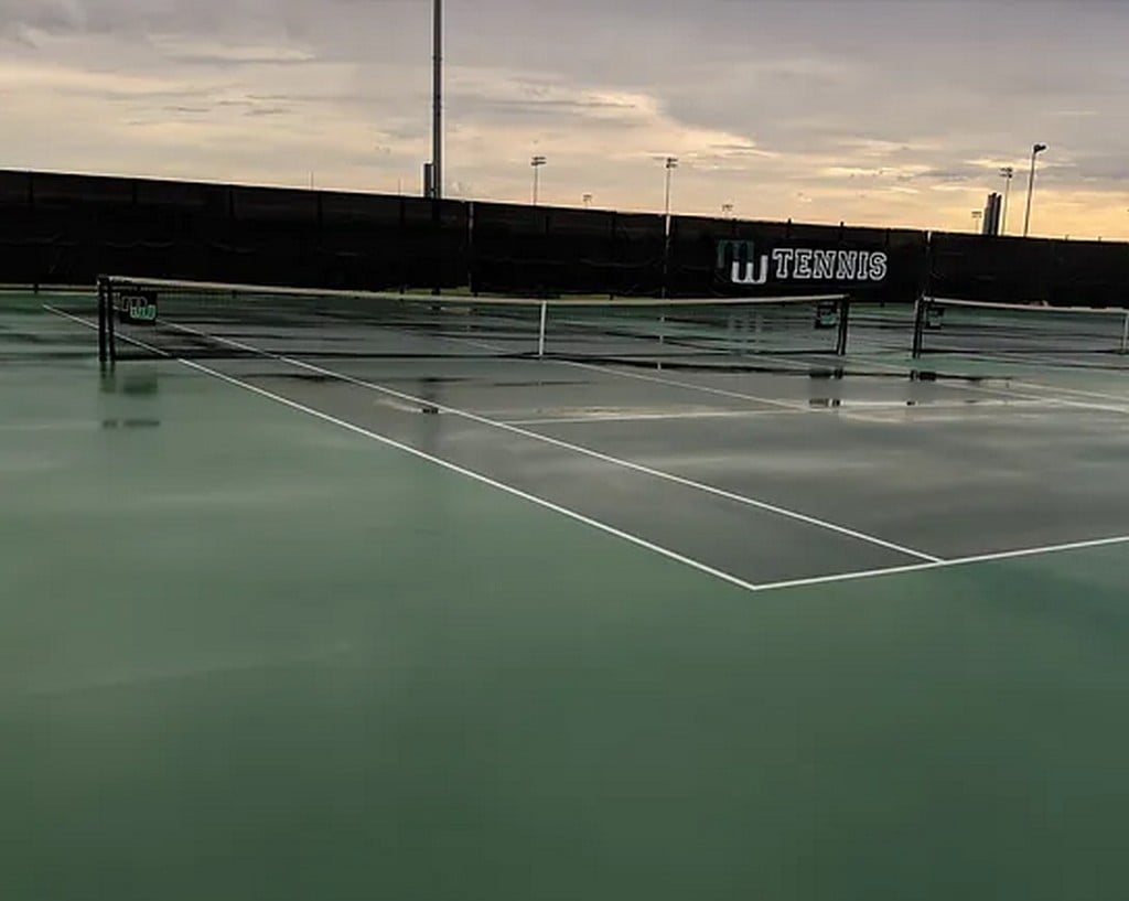 long shot of wet tennis court
