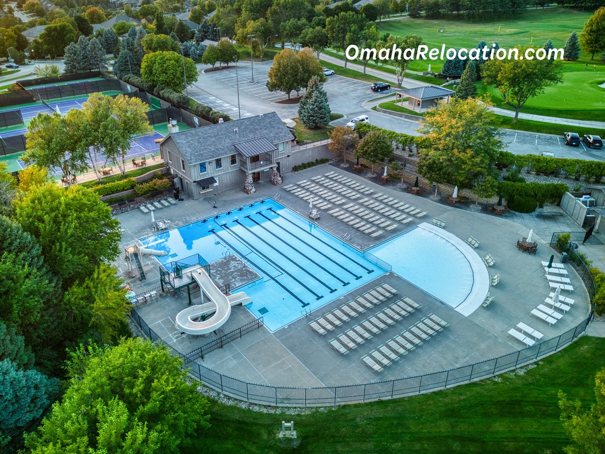 Pool at Shadow Ridge Country Club in Omaha, Nebraska. With homes and tennis courts in the distance.