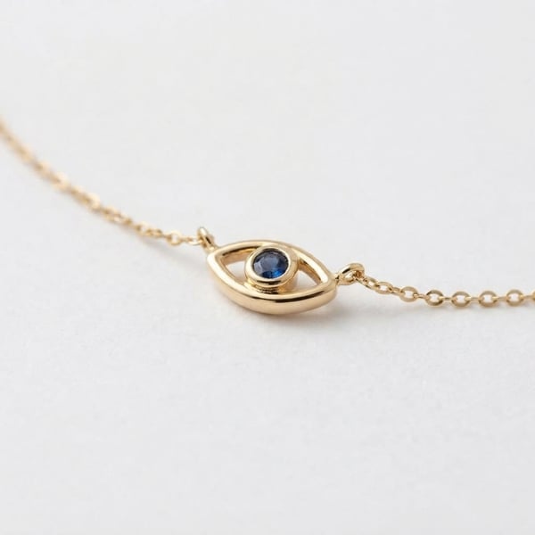 Three-quarter view — Sayida 18K Gold Sapphire Evil Eye Necklace