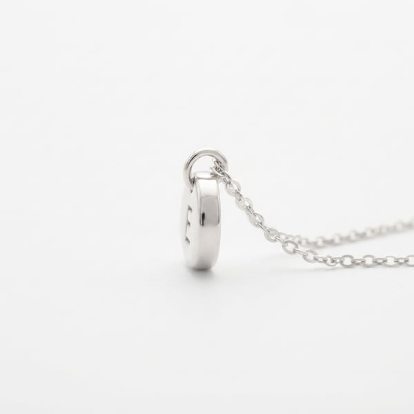 Side view — Mafaza Initial E Sterling Silver Pebble Necklace