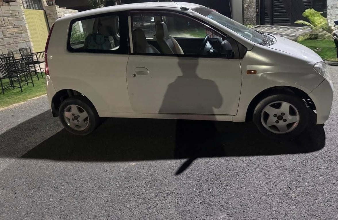 Daihatsu Mira 2011 photo 2