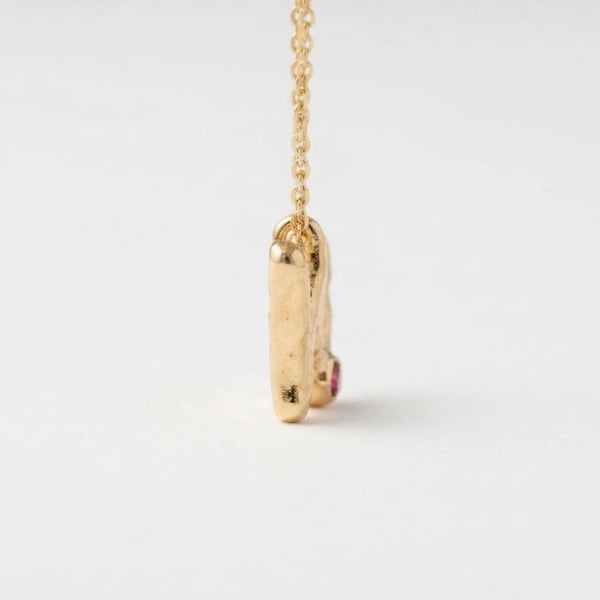Side view — Nusrat Initial W 18K Gold Ruby Necklace