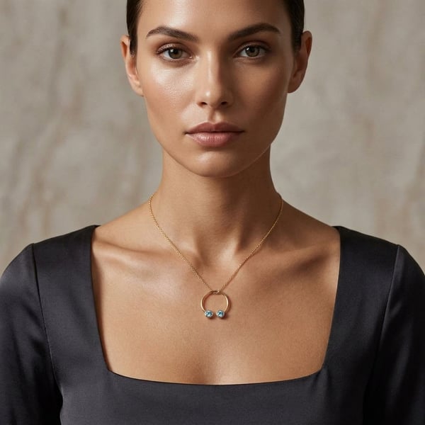 Muhsinah 18K Gold Sky Blue Topaz Open Cuff Pendant