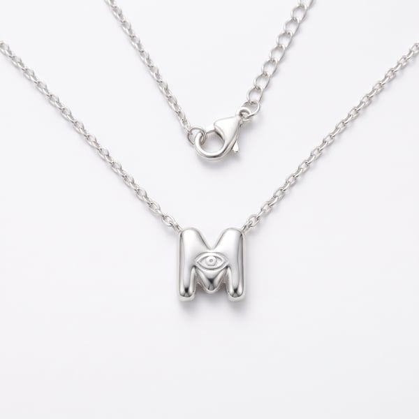 925 sterling silver kids initial M pendant necklace with smooth puff design on a white background.