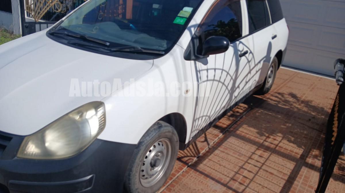 2011 MAZDA FAMILIA