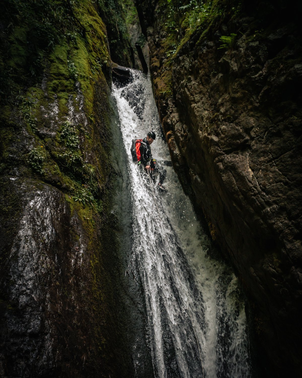 canyoning-guide-abseils-down-epic-corkscrew-waterfall-decent-in-alva-glen