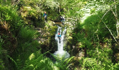 guest slides into dollar glen on canyoning and gorgewalking experience near edinburgh and glasgow