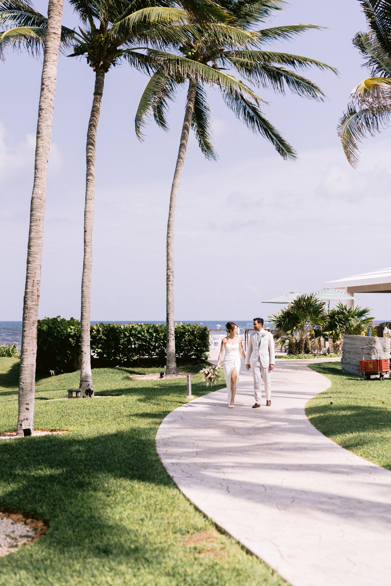 The palm-lined path down to the ocean