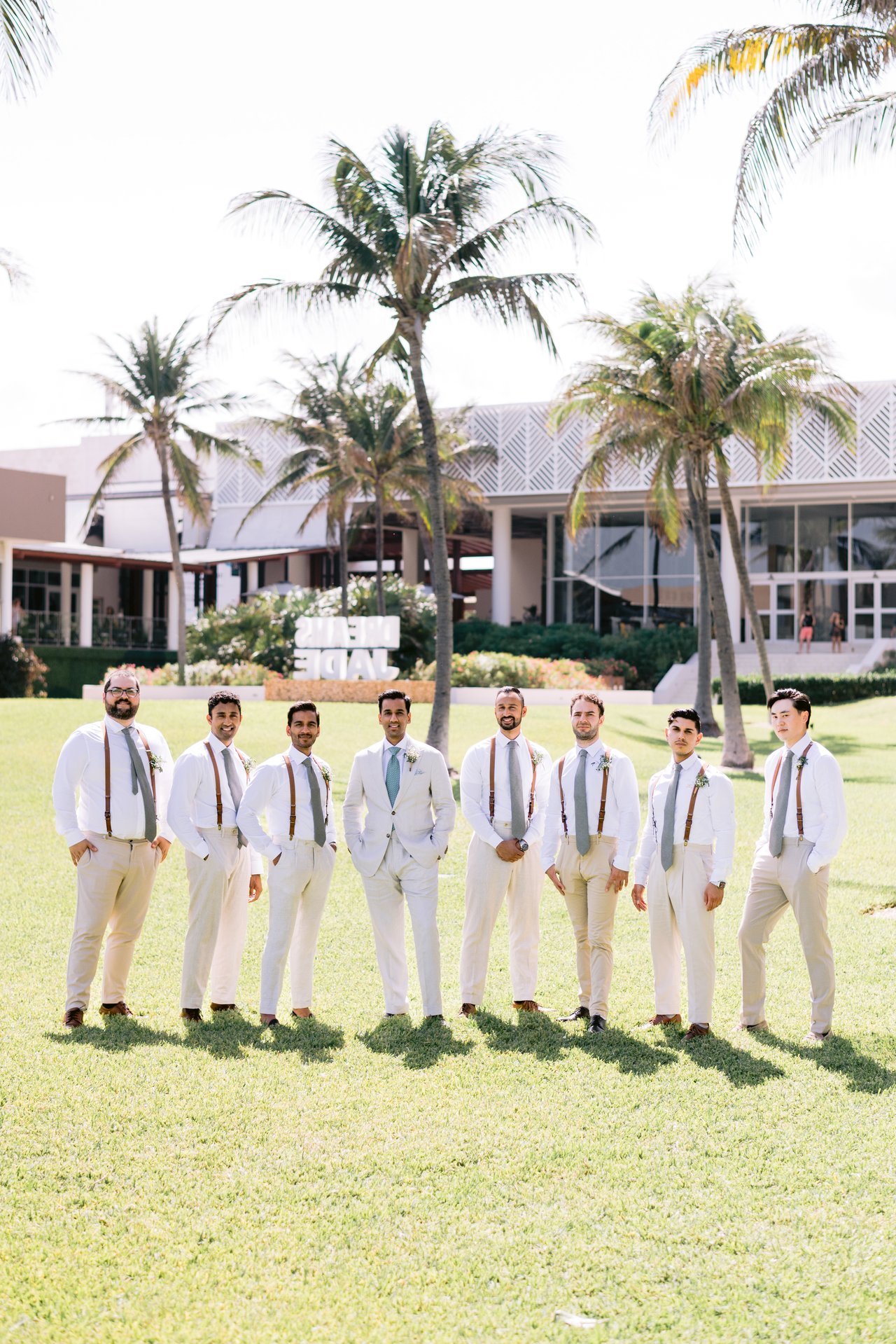 The groomsmen in sand linen