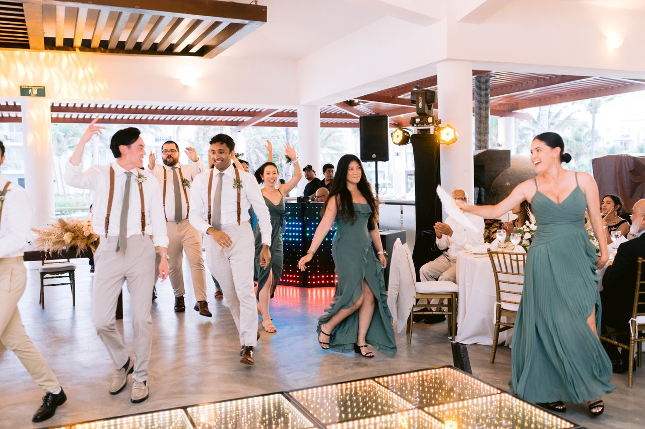 The wedding party&rsquo;s grand entrance