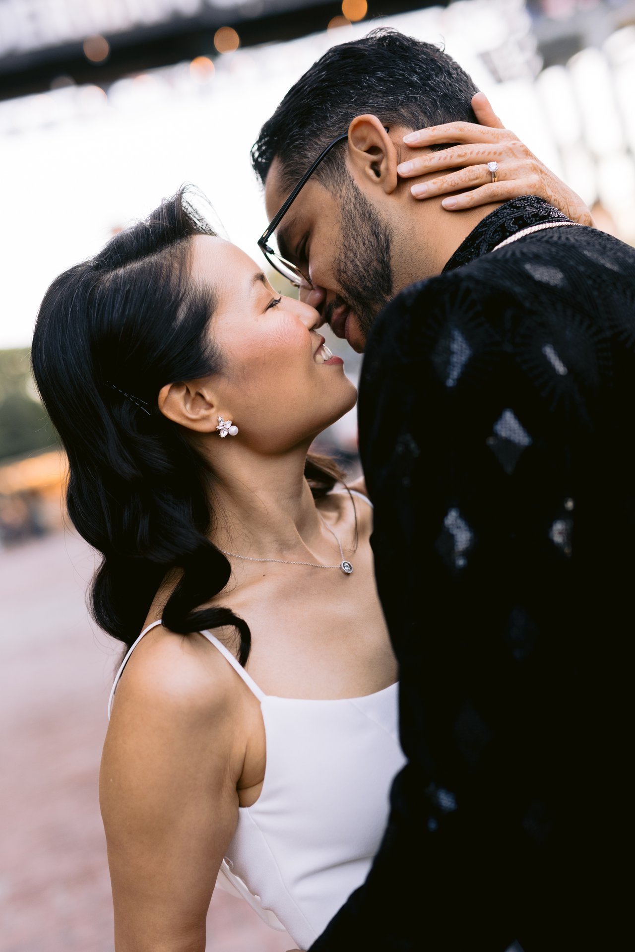 A tender moment between Vicky and Saurabh in the golden evening light