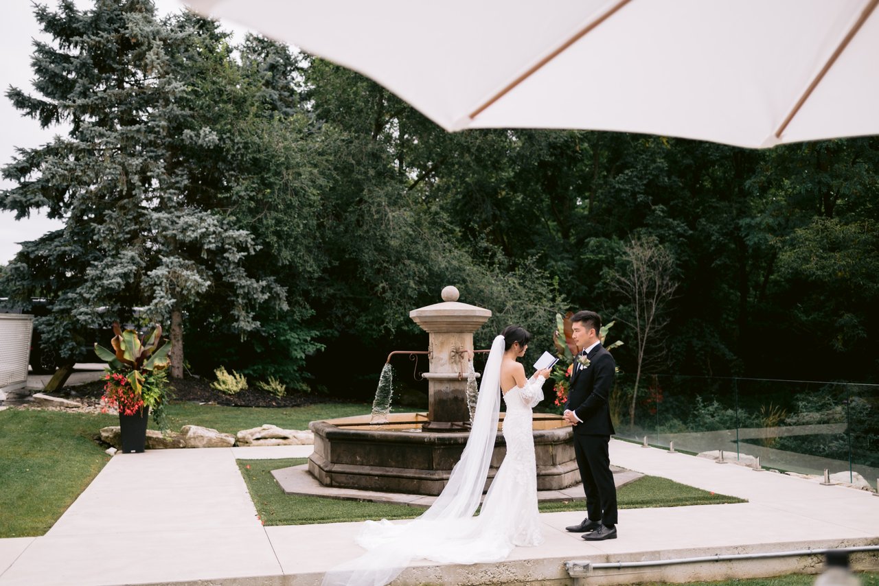 The veil catching the wind at the fountain