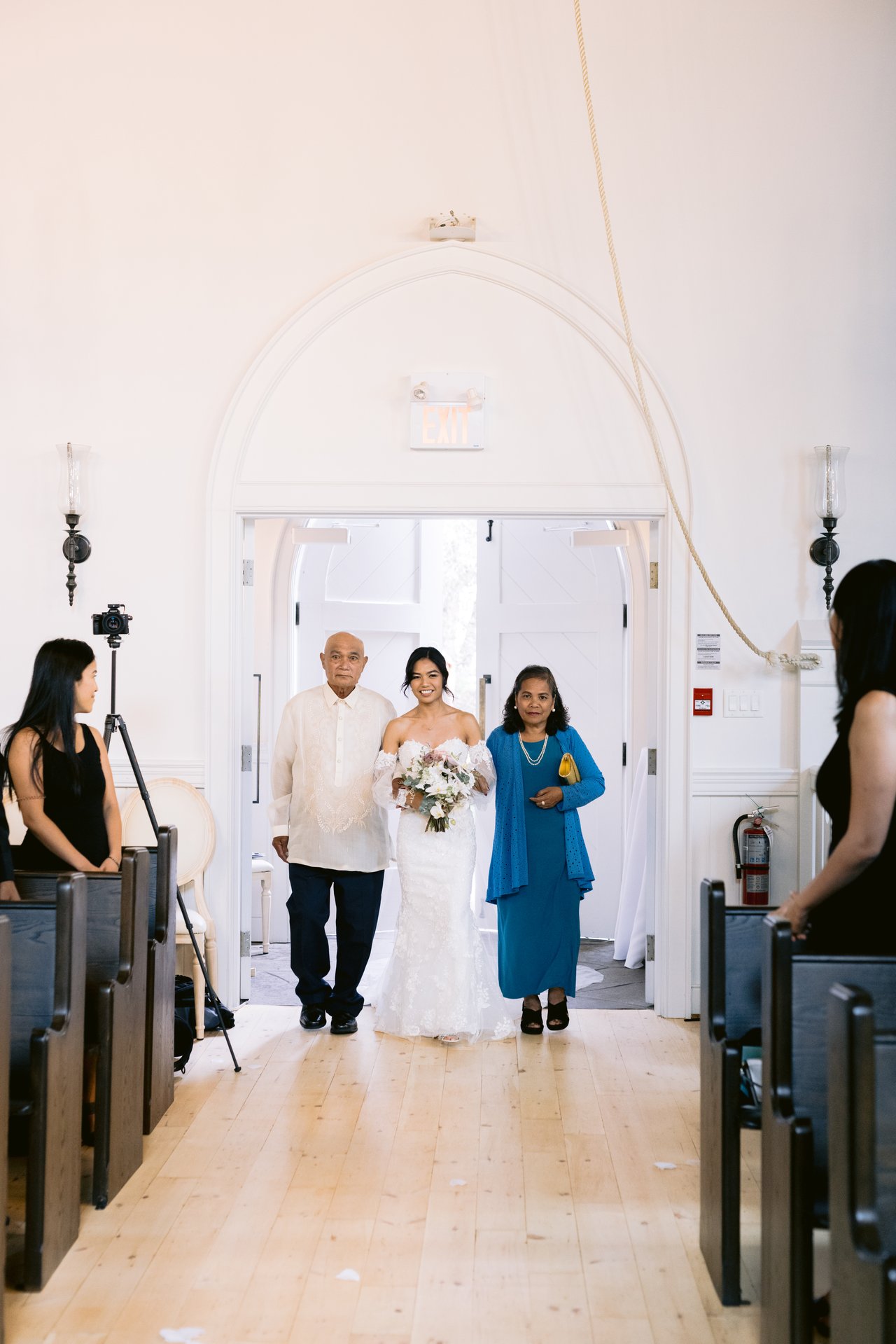 Kat down the aisle with her parents
