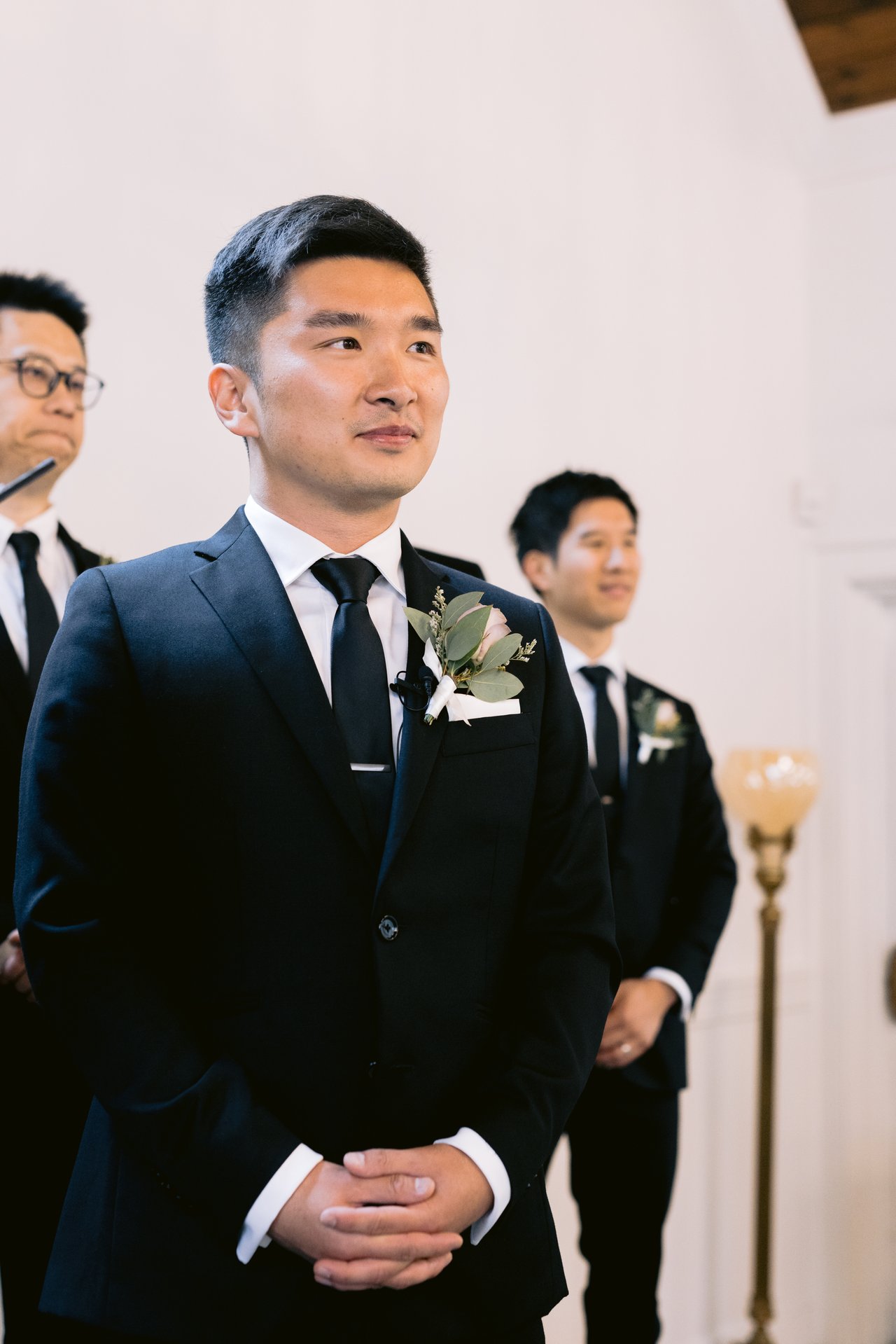 Elan at the altar, watching her come