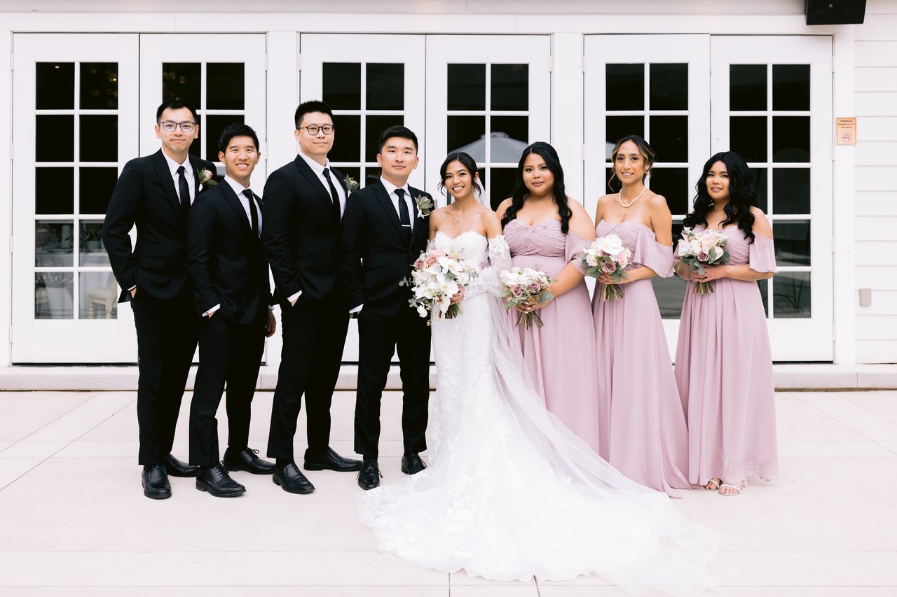 The full wedding party &mdash; dusty pink and black tie