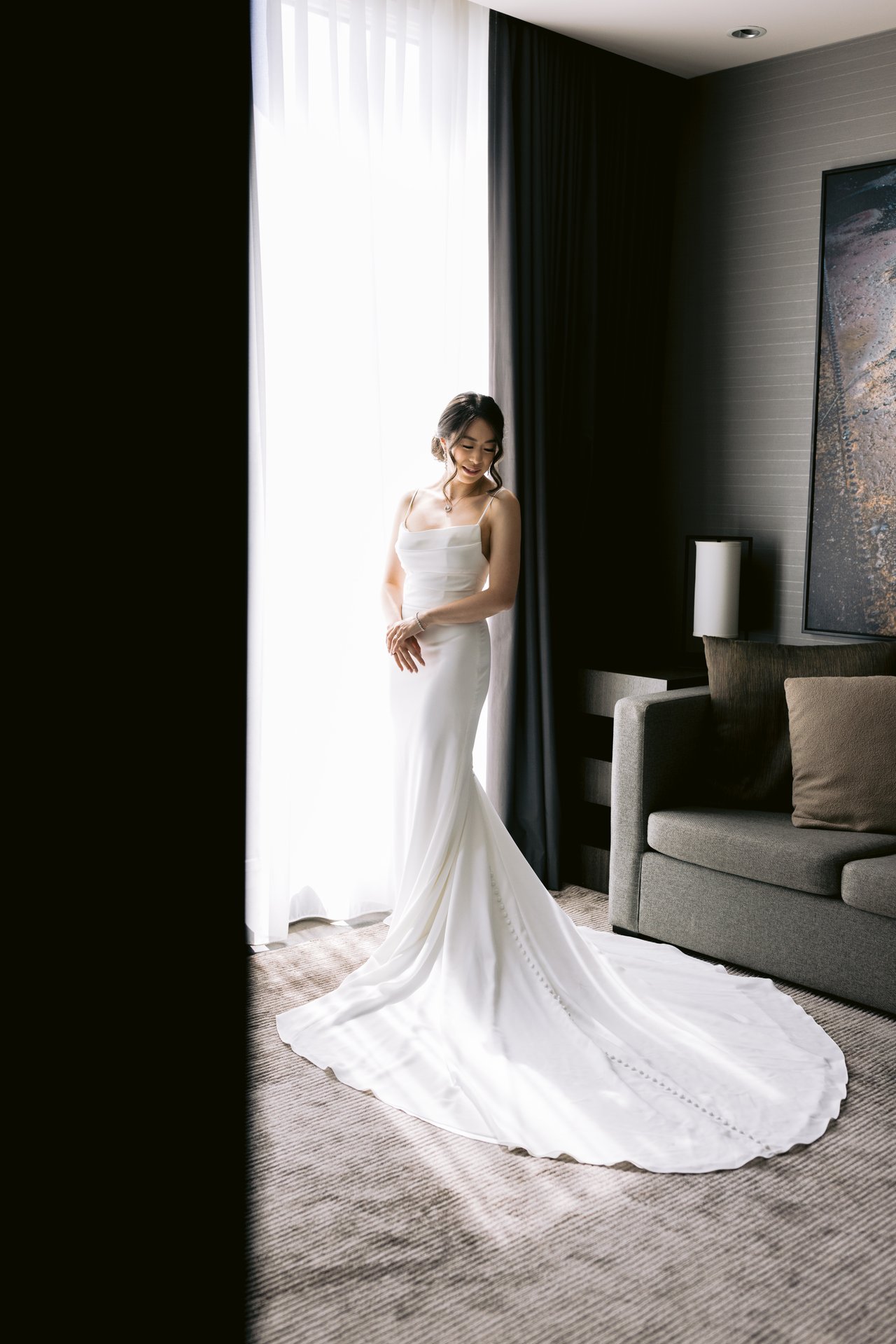 Katie in her gown, the train spread across the floor