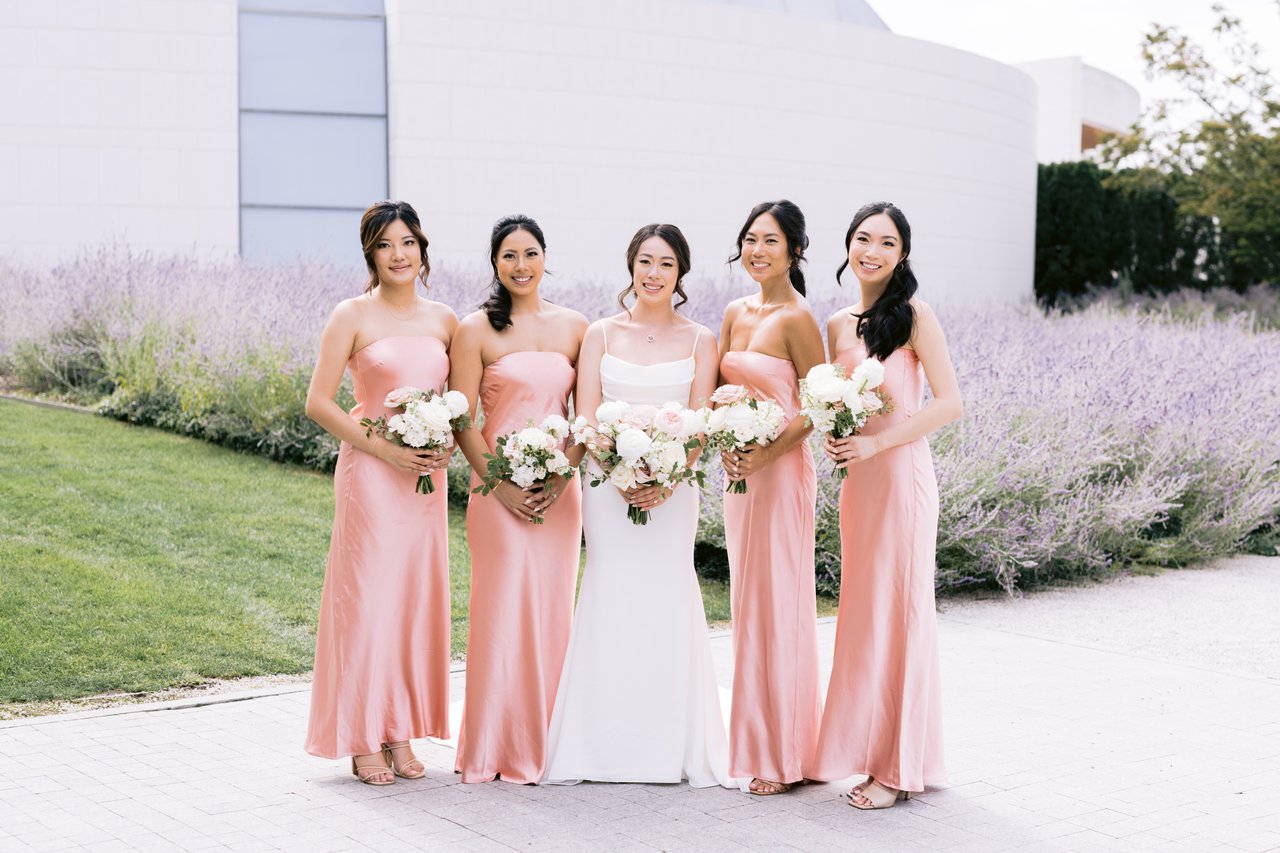 The bridesmaids with their bouquets