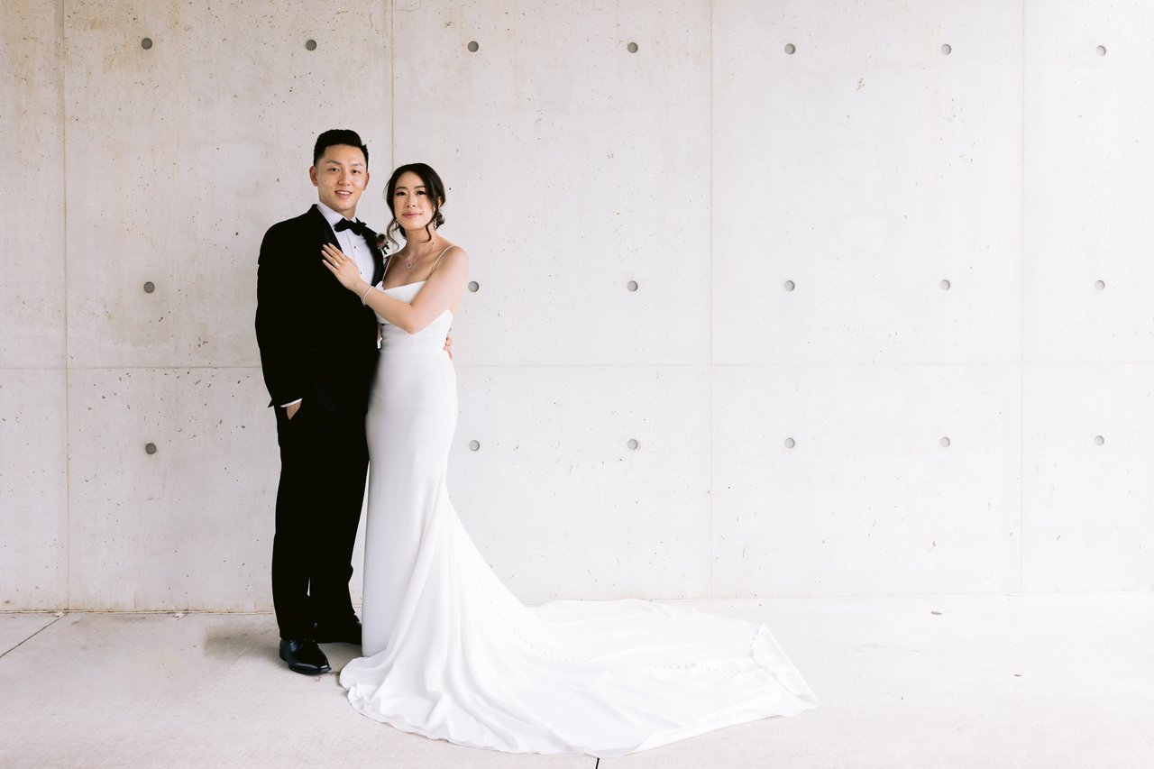 Katie and Harry at the concrete wall, the gown spread